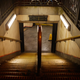 Amber-lit-stairs-of-Bethnal-Green-London-Tube-Station